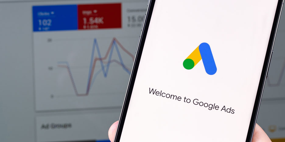 Pay for Performance PPC Services A user on a phone with Google Paid Advertising logo and the welcome text,